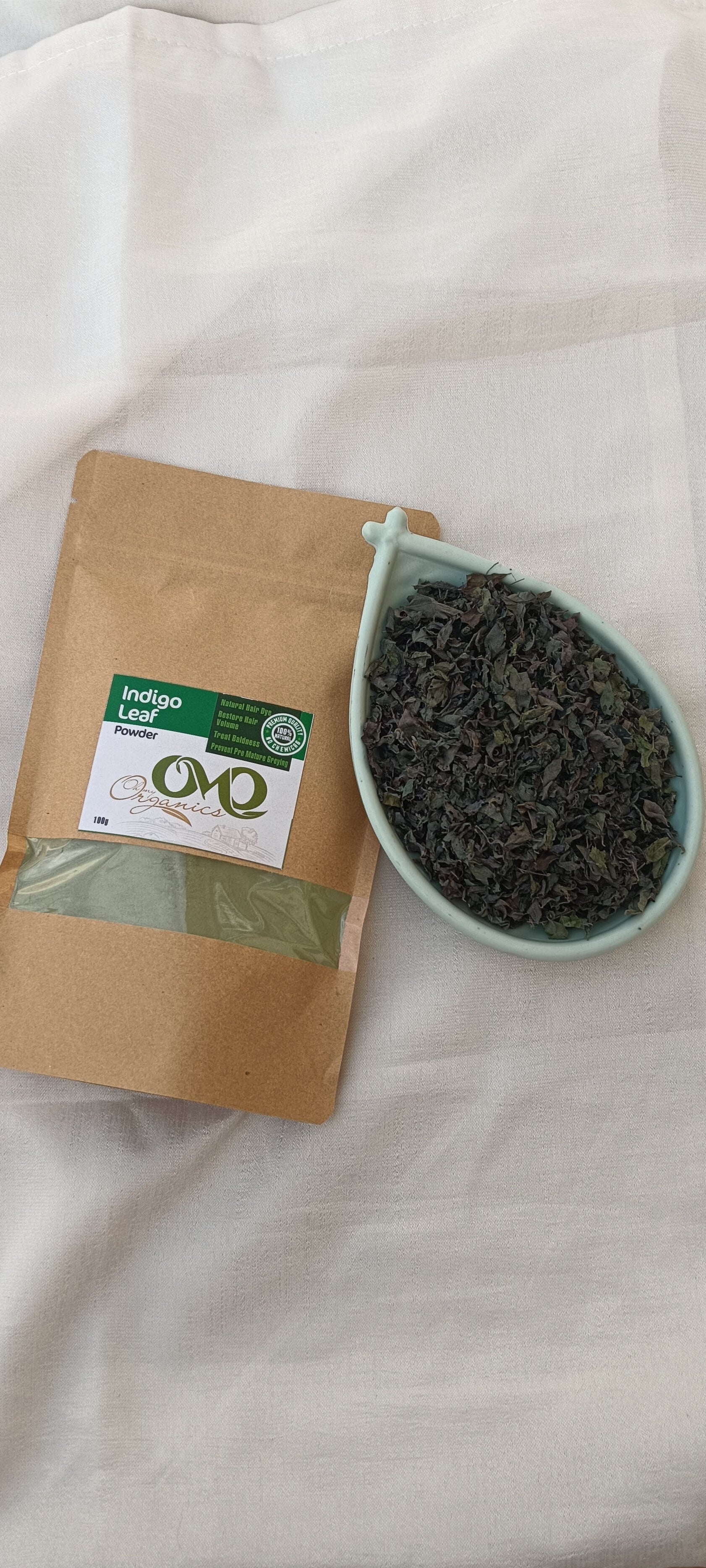 Pure Indigo Leaves Powder with Leaves white background