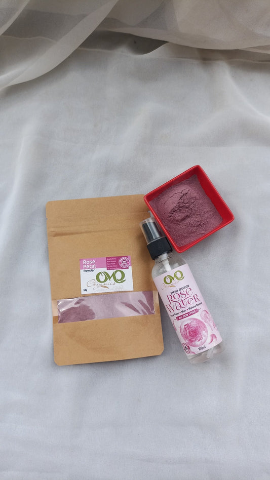 Rose Petals Powder with white background and rose water bottle